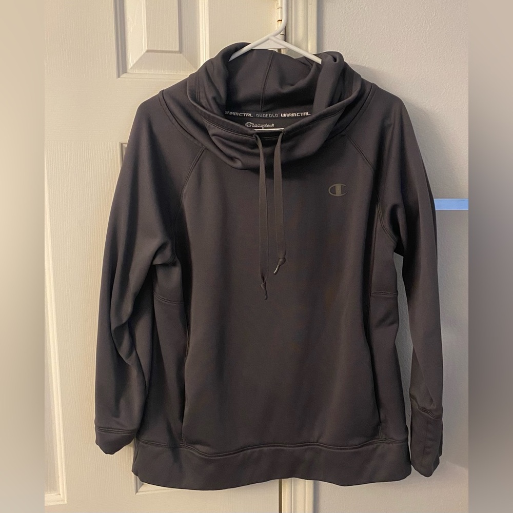 Champion pull over. Has pockets in the front to keep your hands warm.